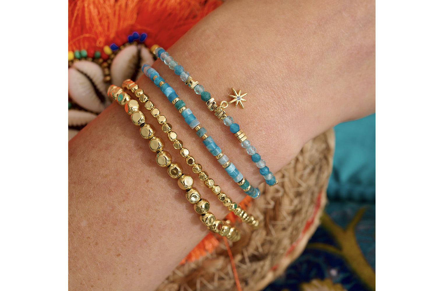 Golden chains and Apatite oceans make for the perfect accessory to any summer outfit.