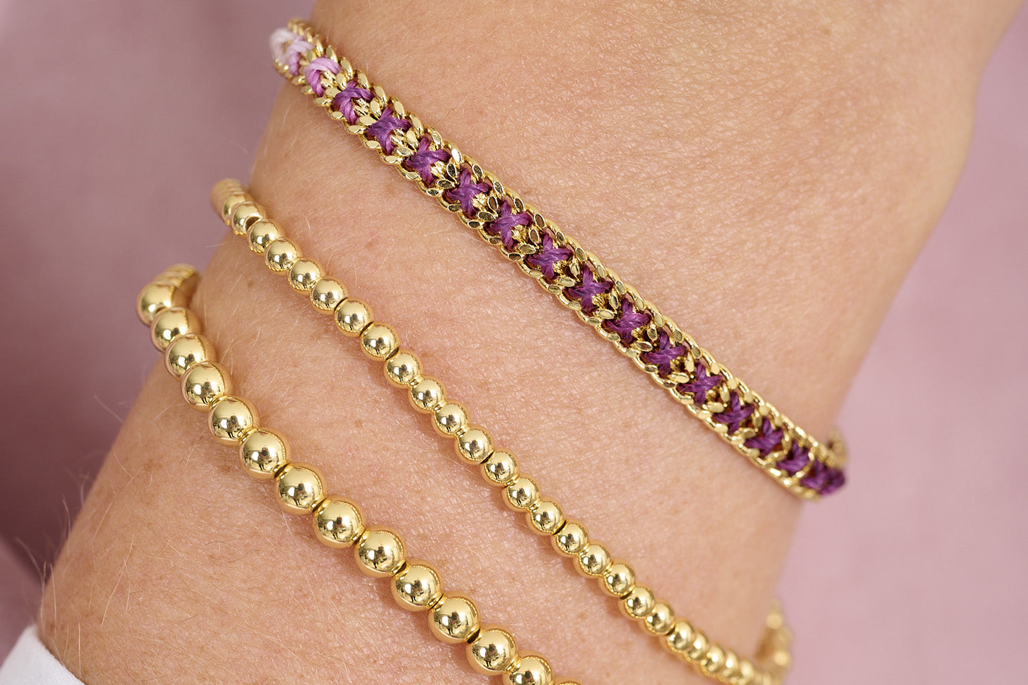 Gleaming Gold Samra and the Purple Ombre Lilia Bracelets.