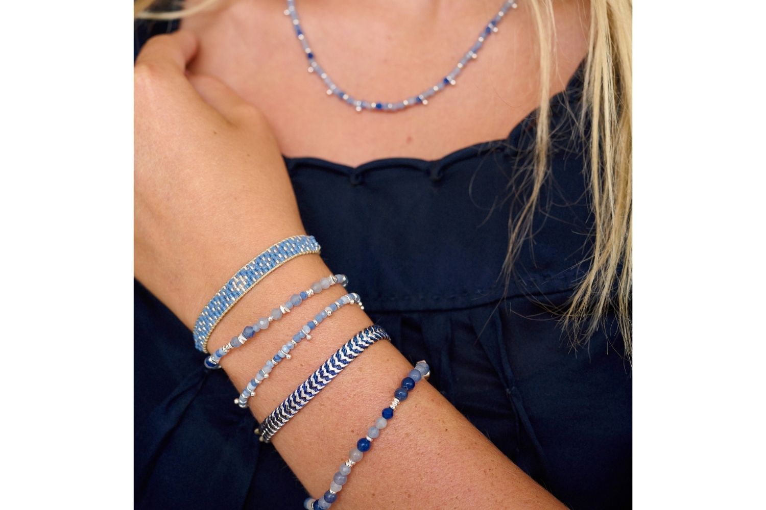 Bliss Blue Aventurine Silver Bracelet styled on the wrist, showcasing dreamy blue gemstones and sleek silver accents for a chic, coastal vibe.