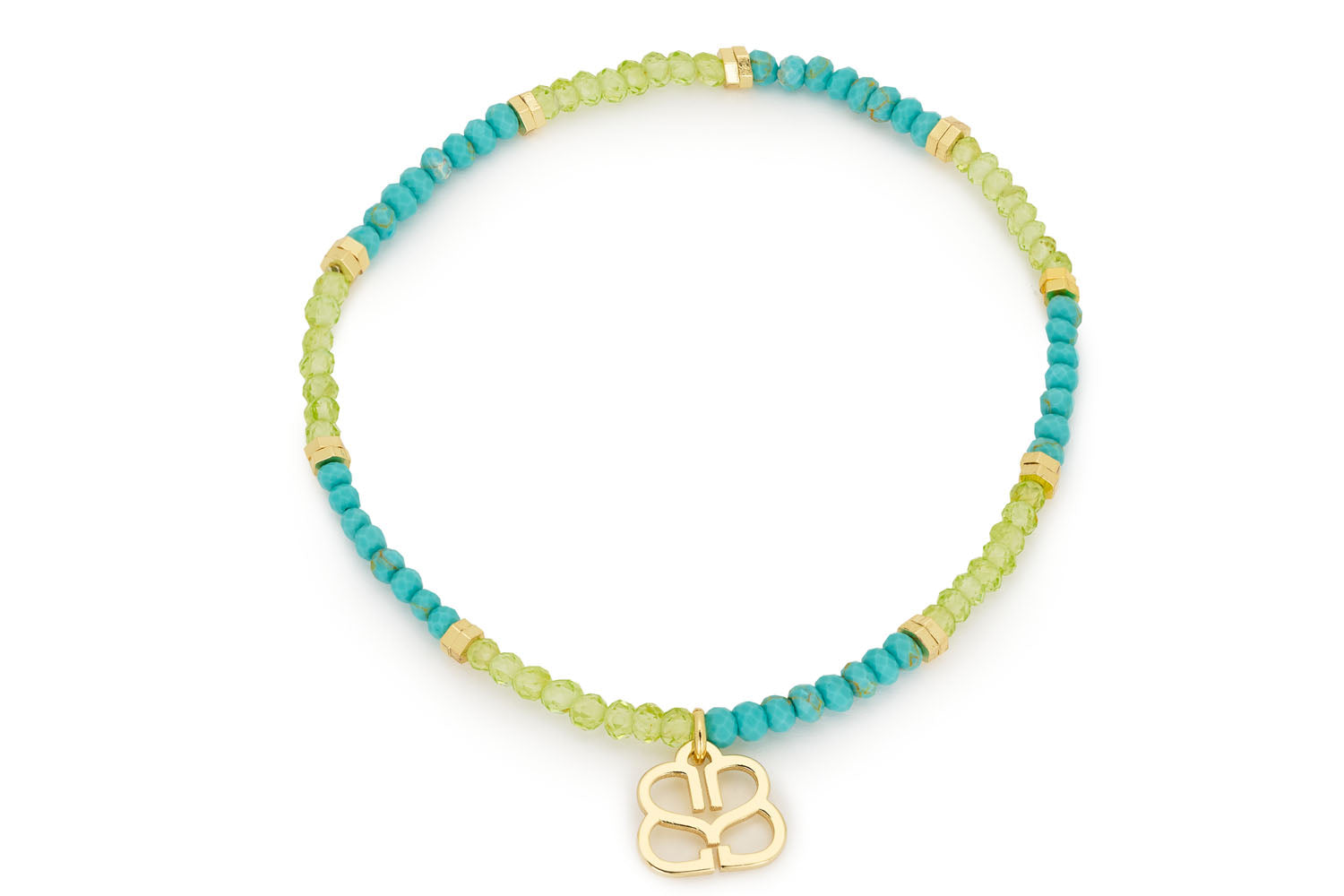 Cerise Peridot & Turquoise Gold Charm Bracelet featuring vibrant turquoise and peridot beads, gold accents, and a stretch design for an easy and comfortable fit.