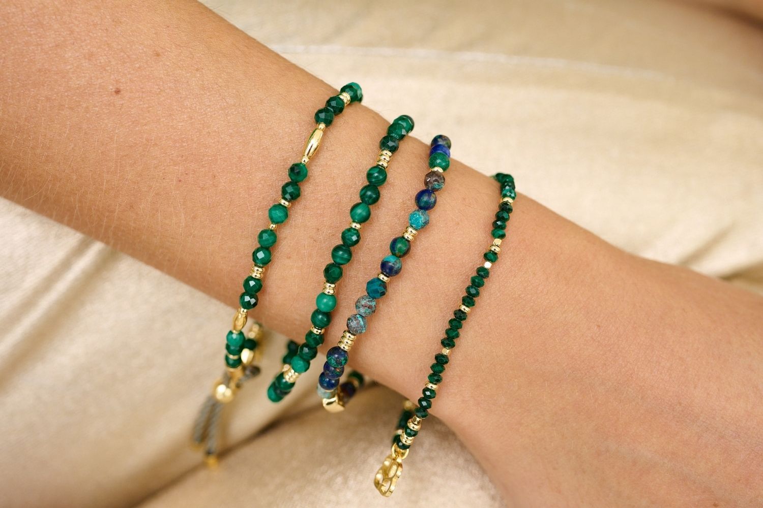 Dash Gold & Malachite Beaded Stretch Bracelet styled on the wrist, featuring Malachite beads and gold accents, perfect for layering or wearing solo.