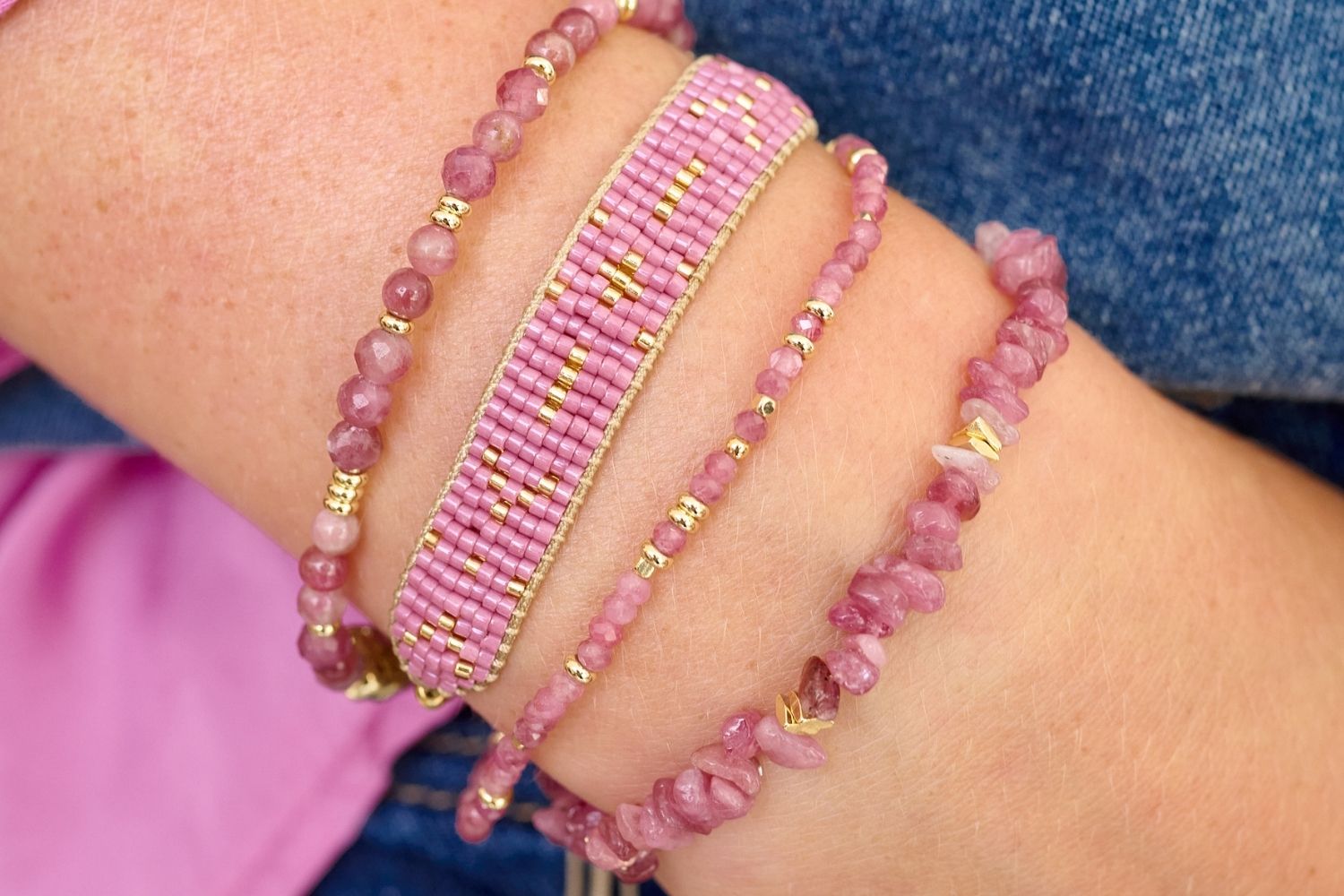 Grace Gold & Raspberry Beaded Friendship Bracelet featuring seven rows of hand-threaded Japanese Miyuki beads in soft berry tones, accented with 12k gold-plated elements, adjustable slider for a perfect fit.