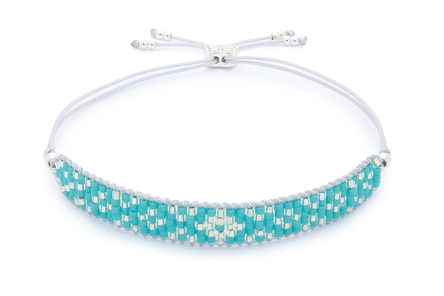 Maya Silver & Turquoise Beaded Friendship Bracelet featuring five rows of turquoise Miyuki beads and sterling silver-plated accents, perfect for adding coastal vibes to your style.