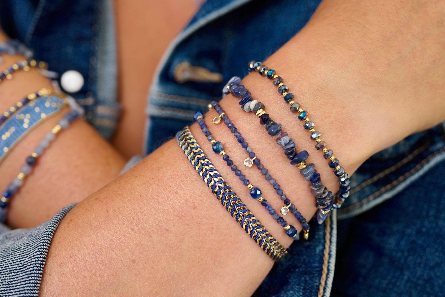 Meadow Gold & Kyanite Beaded Slider Bracelet styled on the wrist, featuring shimmering Kyanite beads and gold accents, perfect for layering or wearing solo.