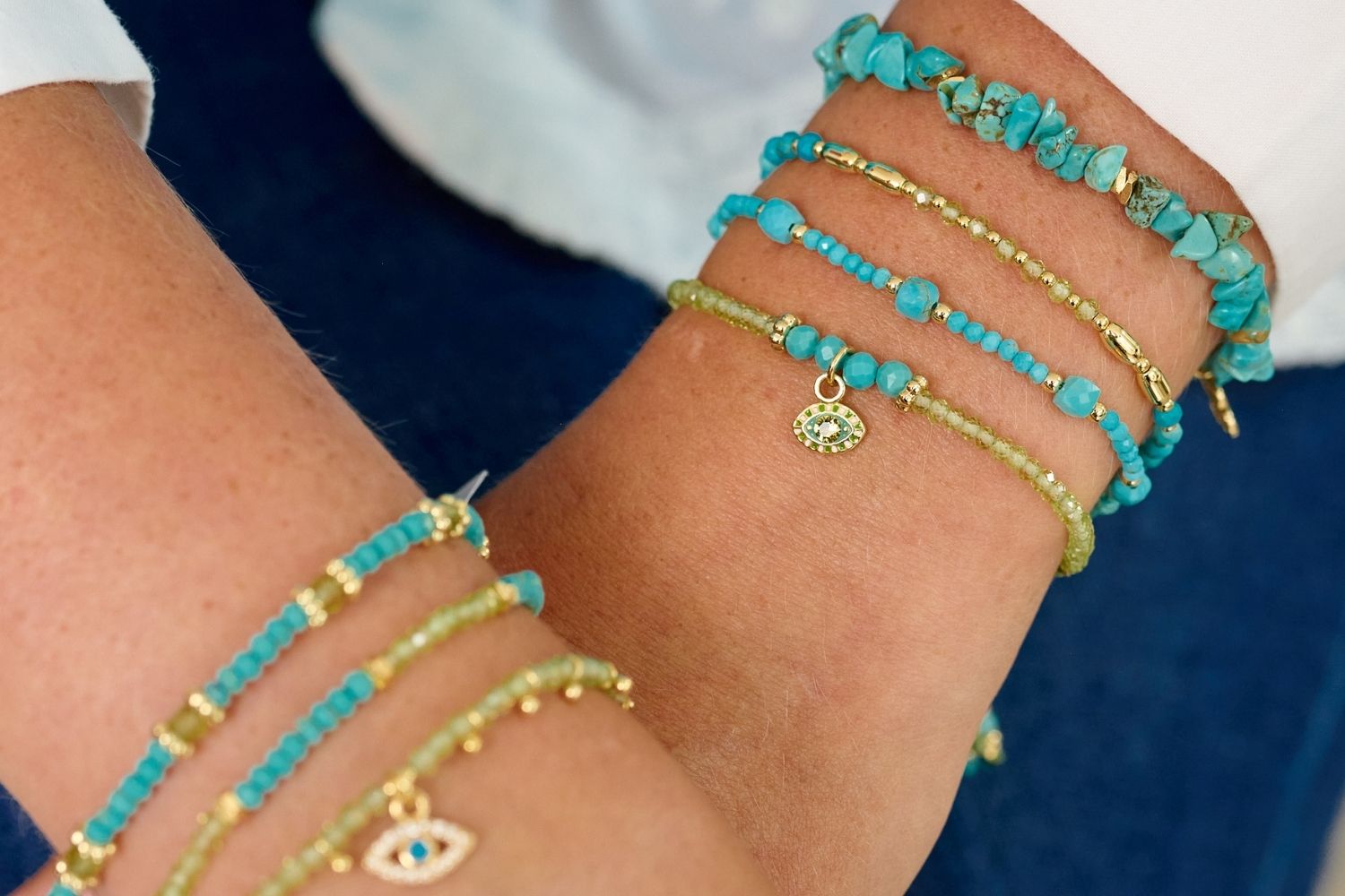 Meadow Gold Slider Beaded Turquoise Bracelet styled on the wrist, featuring turquoise beads and gold accents, perfect for layering or wearing solo.