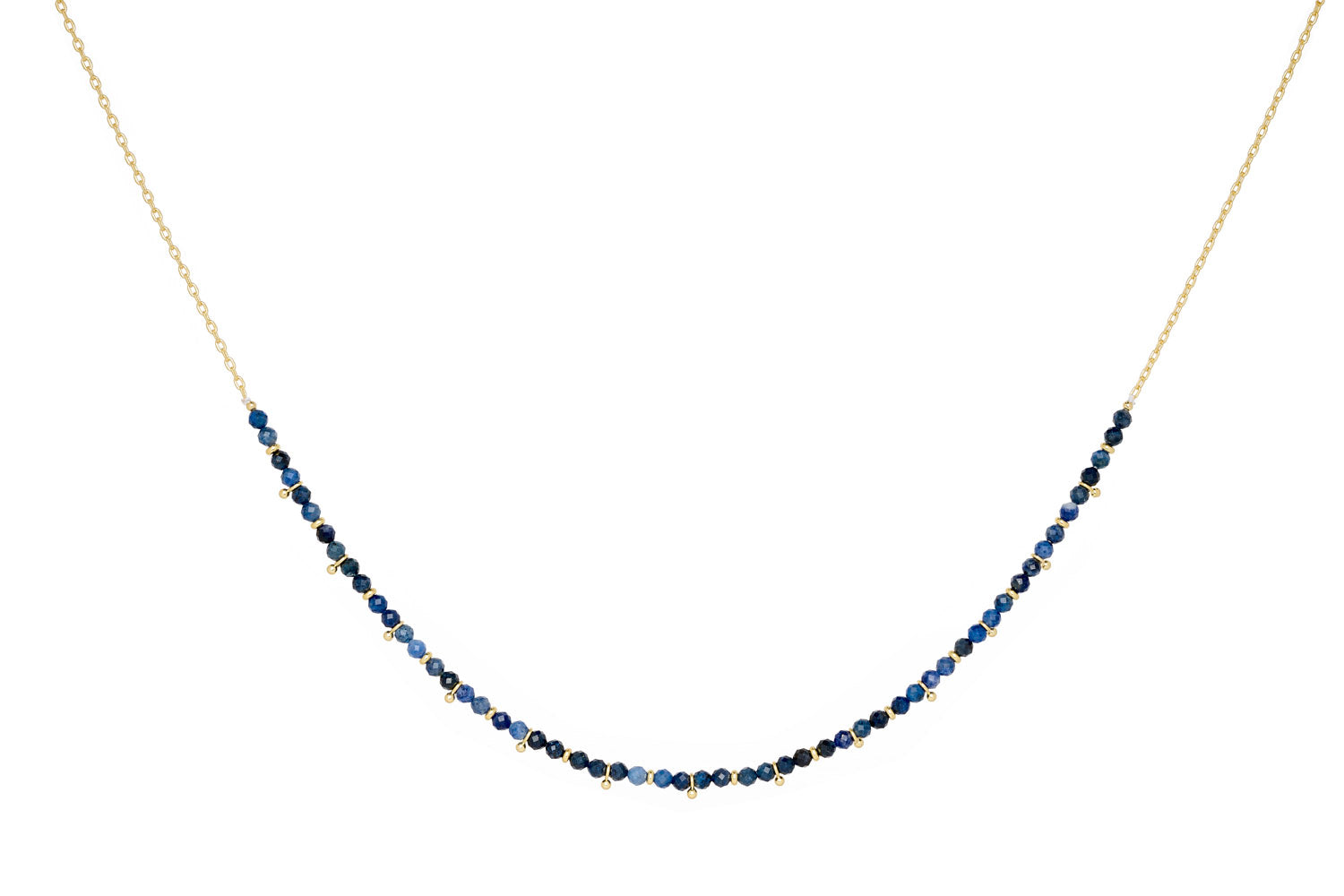 Salus Sodalite Necklace Gold featuring deep blue sodalite stones with 12k gold-plated accents and an adjustable design, perfect for adding a touch of serene elegance to any outfit.